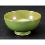 A small Moorcroft green lustre bowl, early 20th century, impressed Moorcroft, Liberty paper label,