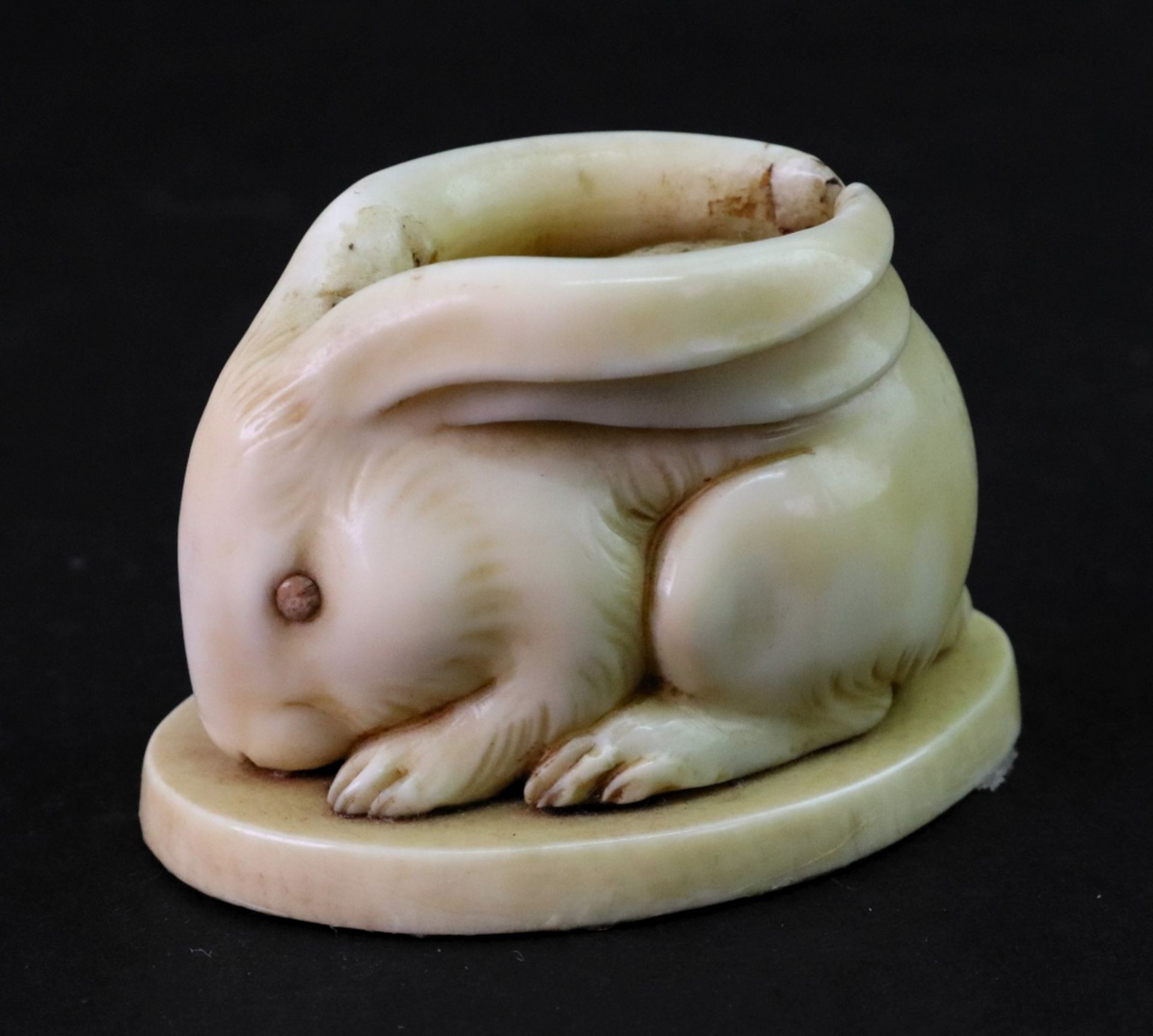 A Japanese marine ivory figure of a hare, Meiji period, modelled crouching with ears pinned back, - Image 3 of 4