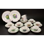 A Copenhagen tea service, 20th century, individually painted with flowers, eleven cups,