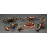 A group of four small Japanese bronze models of crustacea, 20th century, comprising: crab,