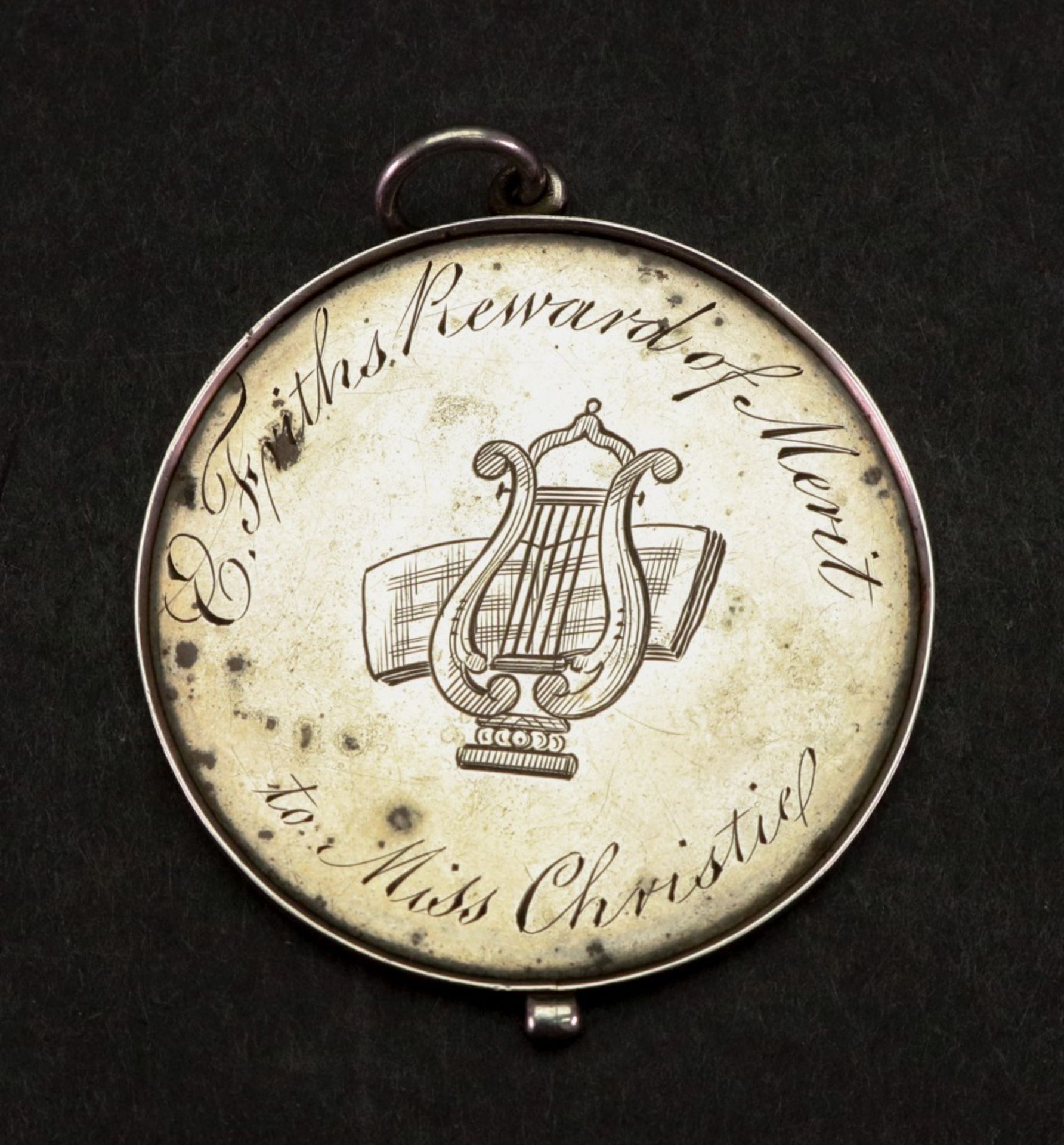 A George IV silver Reward of Merit medal dated 1820,