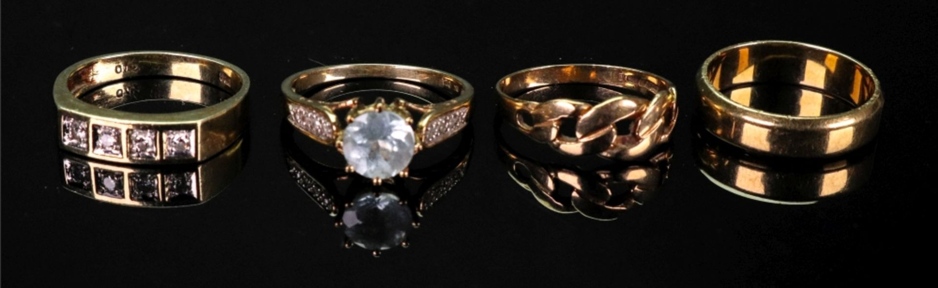 A collection of four gold and gem-set rings, comprising: a diamond set plaque ring, detailed 585,