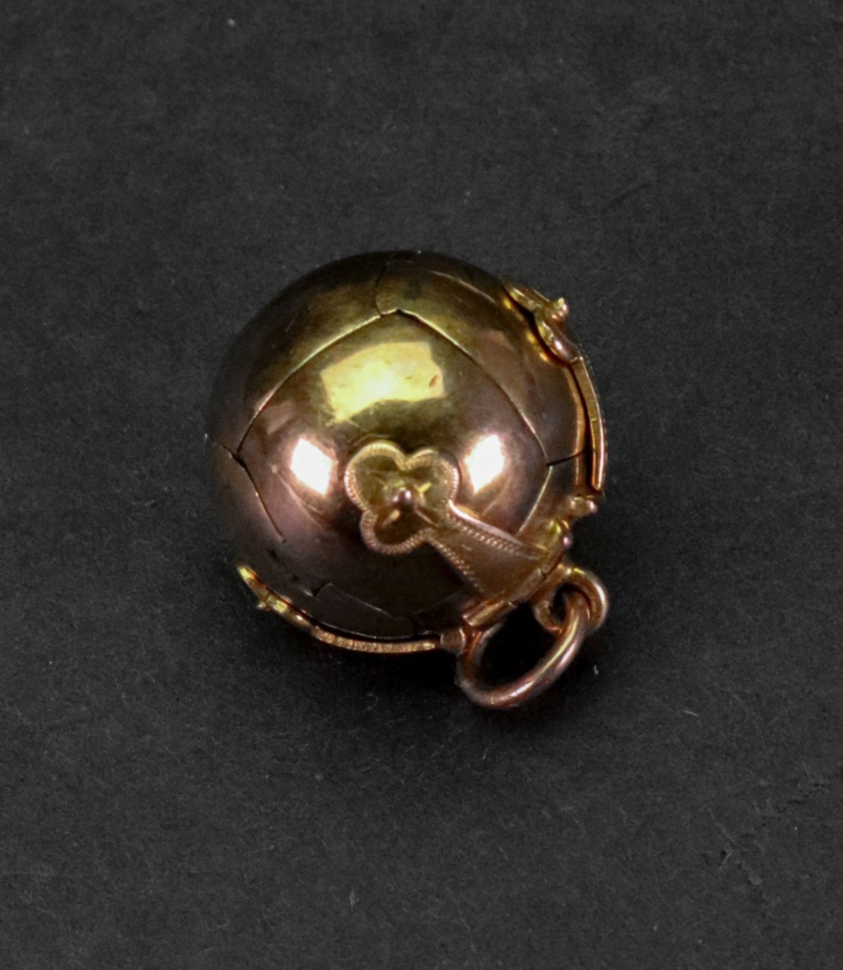 A gold cased Masonic pendant globe, opening to reveal Masonic emblems, marked 9ct, 12. - Image 3 of 3