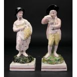 A pair of English pearlware figures, representing Summer and Autumn, circa 1800,