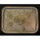 An Islamic rectangular brass tray, late 19th/early 20th century,