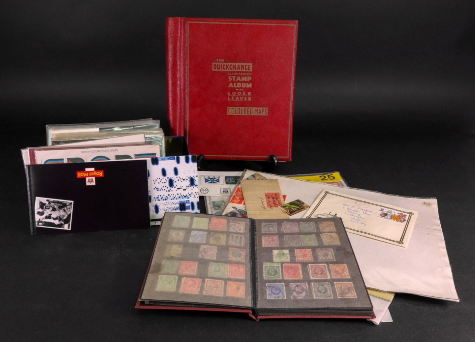 A Quckchange loose leaf album containing an all-world used collection,