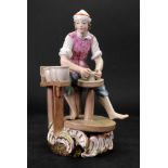 A German porcelain figure, after a Meissen original,