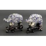 A pair of Chinese lapis lazuli figures of standing elephants, 20th century, 9cm long,