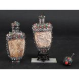 Two Chinese ivory snuff bottles, with white metal and 'jewelled' mounts, late 19th/20th century,