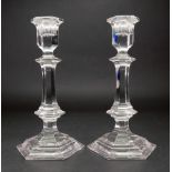 A pair of modern Baccarat glass hexagonal candlesticks, of silver shape in 18th century style,