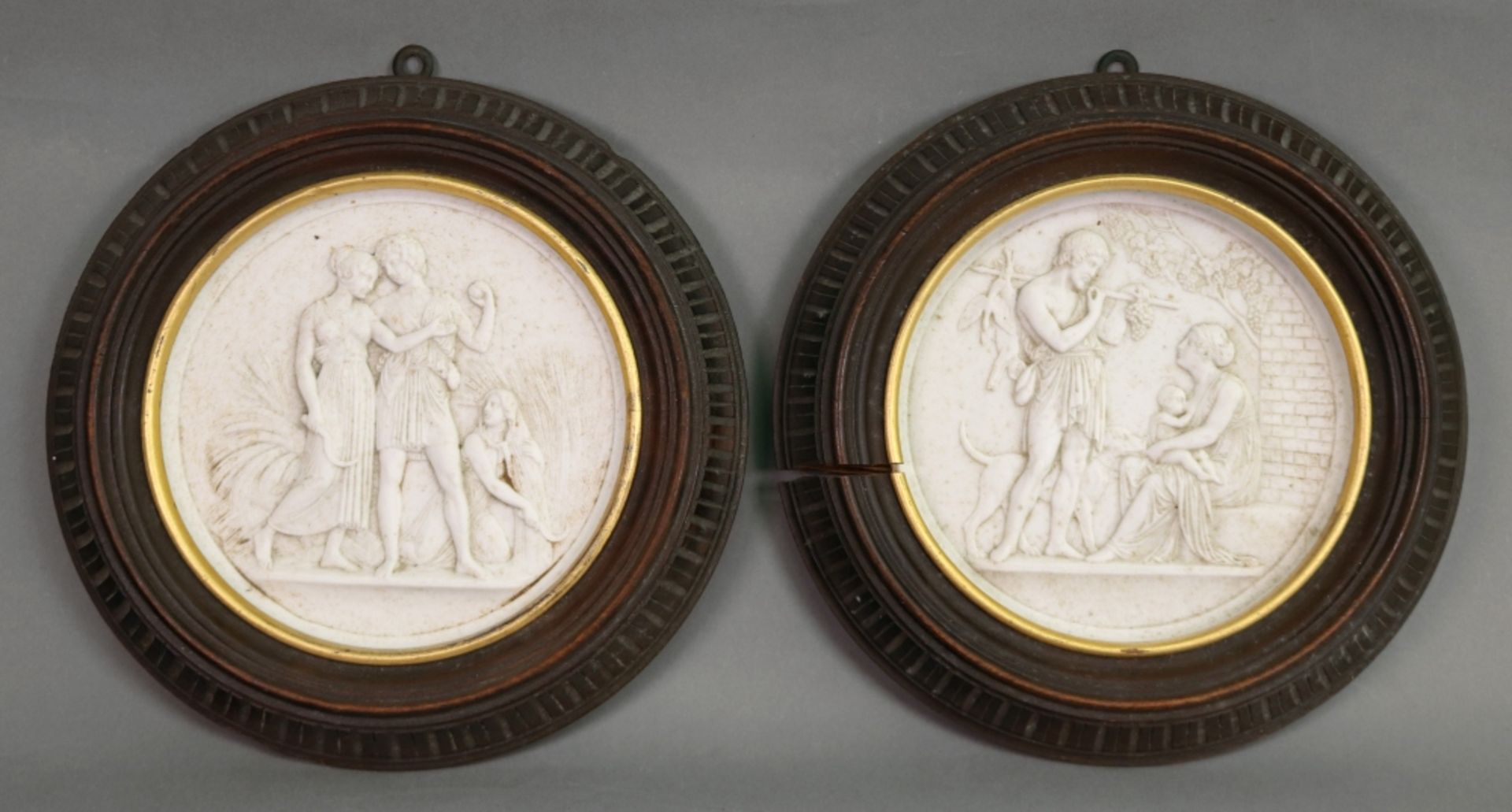 A pair of continental biscuit porcelain circular plaques, probably Copenhagen, 19th century,