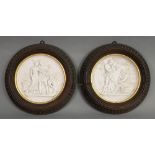 A pair of continental biscuit porcelain circular plaques, probably Copenhagen, 19th century,