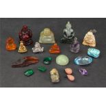 A collection of Buddah charms, stones and other items (qty),