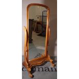 A late Victorian walnut framed floor standing cheval mirror, 73cm wide x 155cm high.