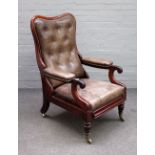An early Victorian mahogany framed leather upholstered open arm easy chair,