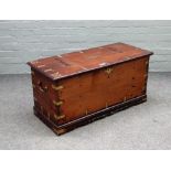 A 19th century Anglo Indian brass bound rectangular trunk, on shaped plinth, 96cm wide x 47cm high.