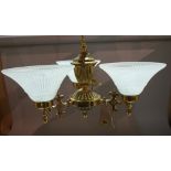 A pair of Victorian single brass three branch chandeliers, with frosted glass shades,