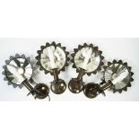 A set of four 'Vaughan' patinated metal single arm wall lights, modern,