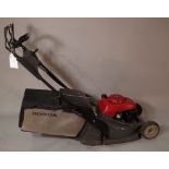 A Honda HRX 476 garden lawn mower.