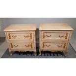 A pair of 18th century style Continental grey painted and parcel gilt decorated two drawer chests,