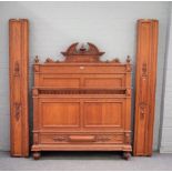 A 19th century French oak double bed, with double panel head and foot board,