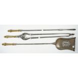 A set of three Victorian steel fire tools with pierced plate and foliate cast brass handles,