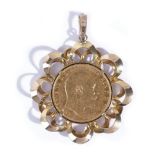 An Edward VII sovereign, 1903 M, in a 9ct gold pendant mount, having a pierced looped surround,