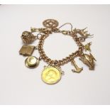 A 9ct gold solid curb link charm bracelet, on a boltring clasp,