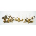 A set of three Empire style three light gilt and patinated bronze chandeliers, 20th century,