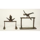 A patinated contemporary bronze modelled as a female gymnast on a highbar, indistinctly signed,