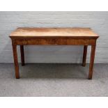 A mid-18th century mahogany side table with rectangular top over plain frieze on canted square