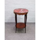 A 19th century French occasional table,