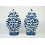 A pair of modern Chinese style blue and white porcelain vases and covers,