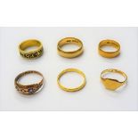 Two 22ct gold wedding rings, combined weight 7 gms, two 18ct gold rings, combined weight 11.