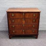 An 18th century Continental walnut four drawer commode with fluted canted corners,