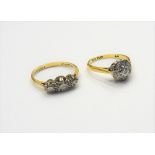 A gold and platinum, diamond set nine stone cluster ring,