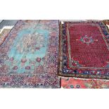 A Saraband rug, Persian, the madder field with rows of boteh,