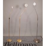 A group of three 20th century brass adjustable floor standing angle poise lamps,