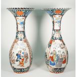 A pair of tall Japanese Imari slender baluster vases, Meiji period,