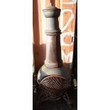 An early 20th century cast iron chiminea, 149cm high.