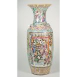 A tall Chinese famille-rose baluster vase, one side painted with a battle scene,