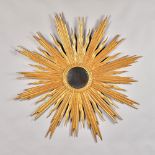 A mid-20th century gilt sunburst wall mirror with convex mirror plate, 120cm diameter.