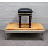 An 18th century style rectangular footstool with silver painted frame on canted block supports,