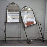 A pair of early 20th century French parcel gilt green painted wrought iron mirror back