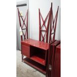 Silvio Cavatorta; a red lacquered shelving unit with lattice supports, 200cm wide x 180cm high, (a.