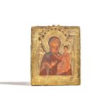 A Russian Icon, mother of God of Smolensk, polychrome painted with gilt metal oklad, 33cm x 27cm.