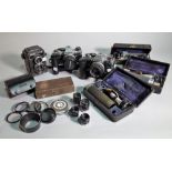 A collection of cameras and scientific equipment, to include Olympus, Lubitel and Kodak.