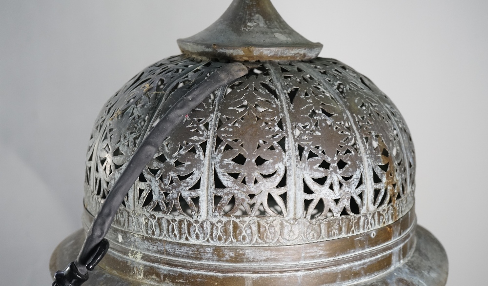 A pierced brass wall lantern, early 20th century, of Moroccan style with domed top and bottom, - Image 2 of 3
