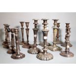 Silver plated wares; a quantity of candlesticks including two telescopic examples.