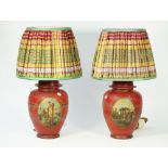 A pair of tole peinte table lamps, early 20th century,